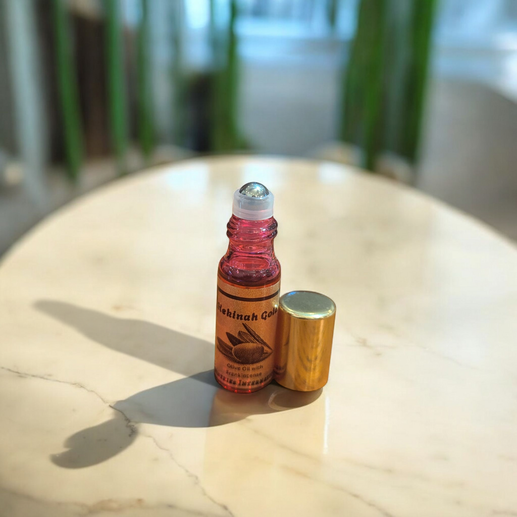 Shekinah Gold Anointing Oil 5ml roll-on glass bottles.