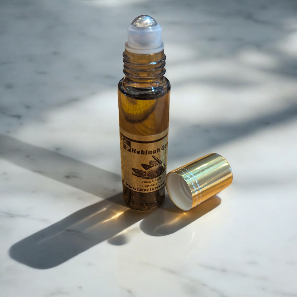 Shekinah Gold Anointing Oil 10ml roll-on glass bottles.