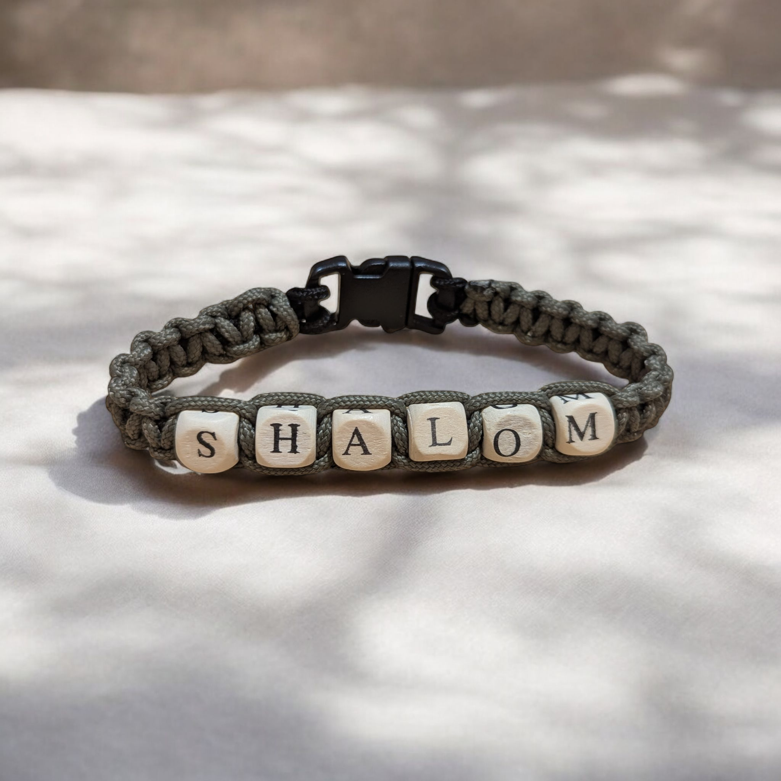 Paracord Bracelet w/ wooden letters.